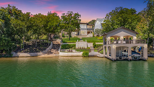 An example of a vacation rental home managed by GuestSpaces that is lakefront on Lake Austin.
